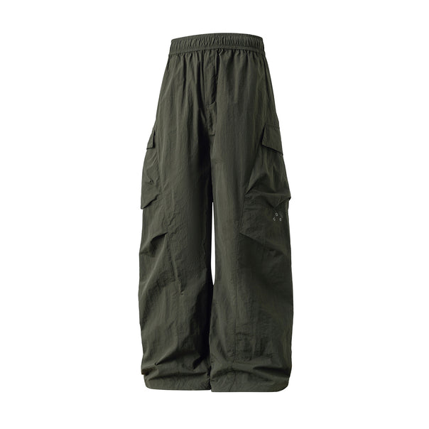 Unisex Wide Cargo Palazzo Pants made of technical crinkle nylon with elastic waistband Mune Fashion