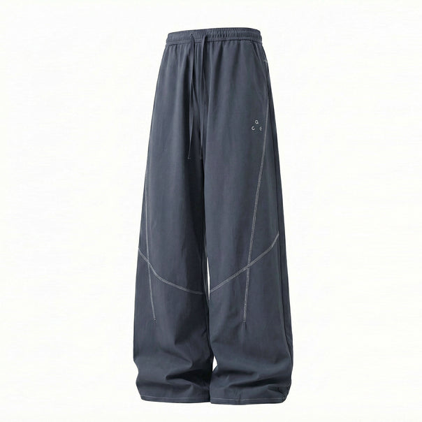 Unisex Wide technical balloon pants with elastic waistband and drawstring Mune Fashion