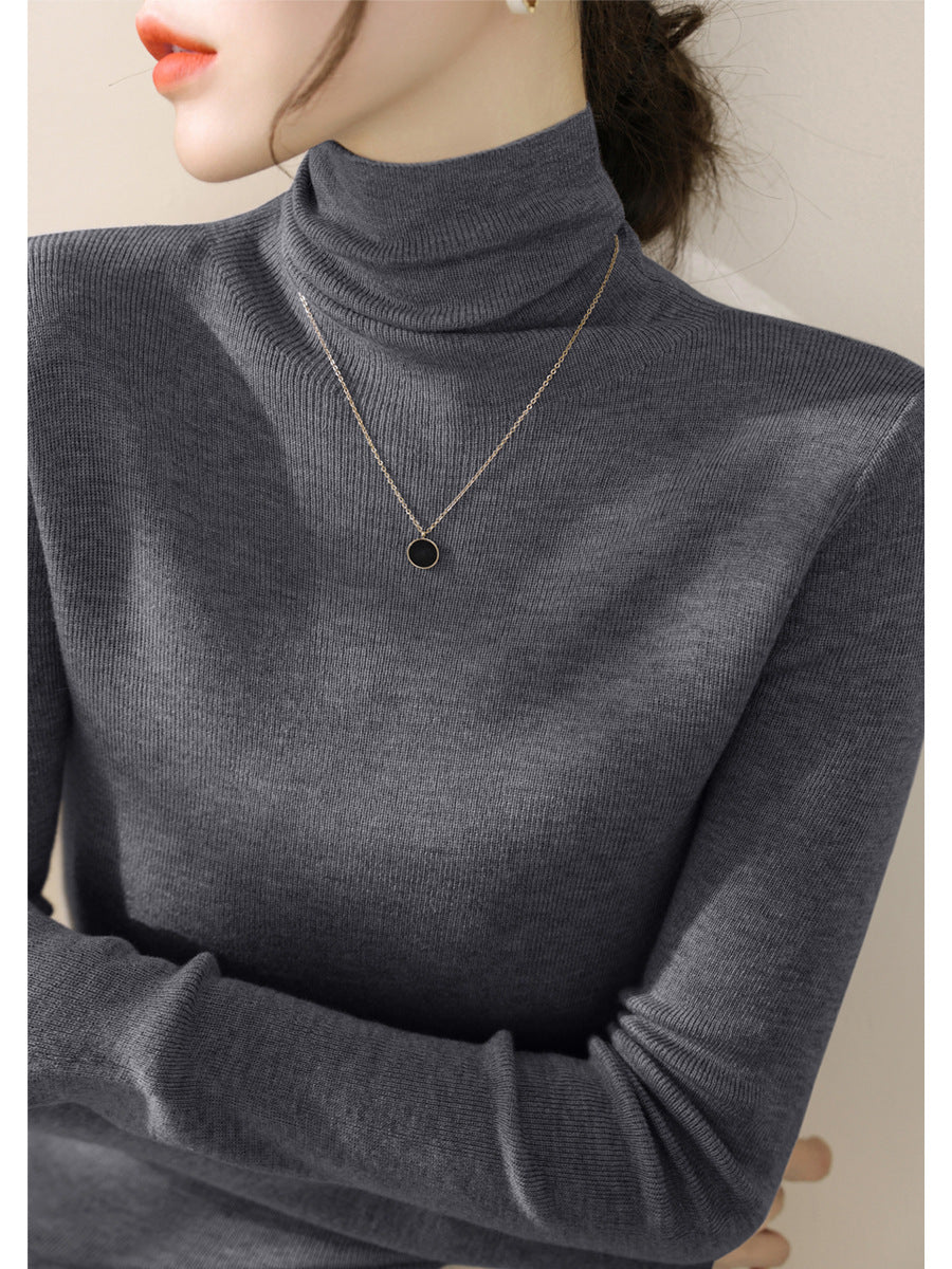Women's knitted sweater, fitted, with stand-up collar