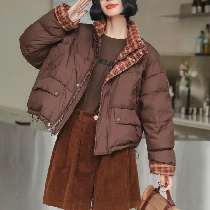 Short women's down jacket with high fill power