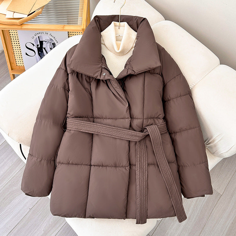 Mid-length women's winter jacket with waist belt