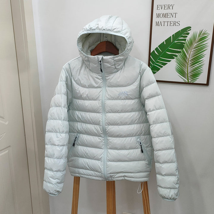 Light women's down jacket with hood, quilted