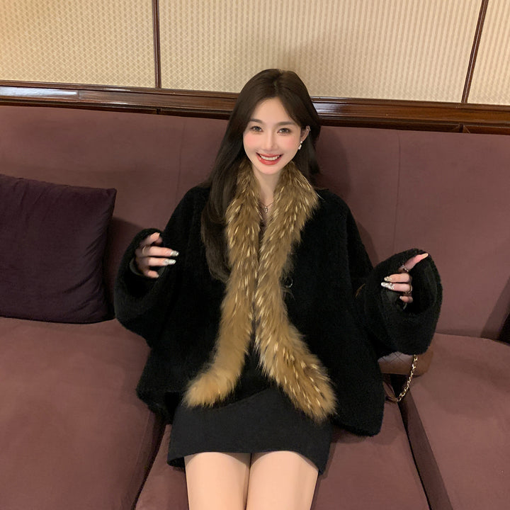 Lamb fleece coat with raccoon fur collar