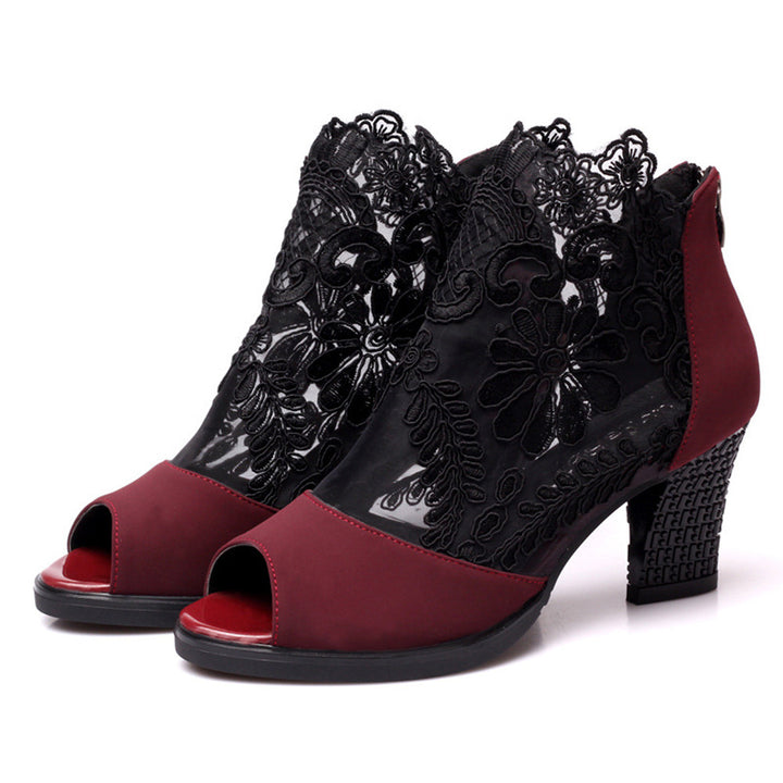 Ladies ankle boots with open toe area, pointed upper material, floral embroidery and comfortable block heel Mune Fashion