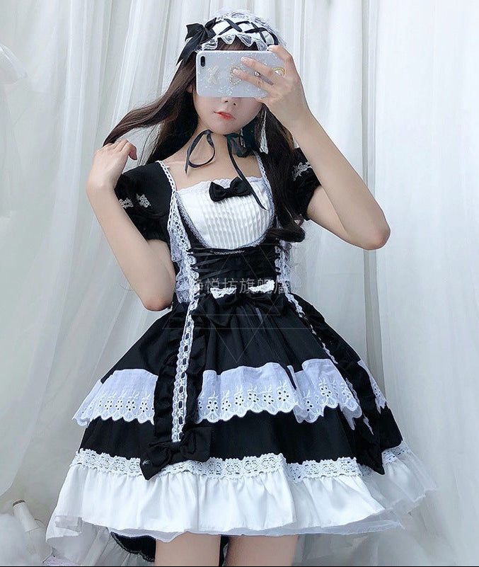 Women playful Lolita dress with elaborate lace and ruffle details Mune Fashion