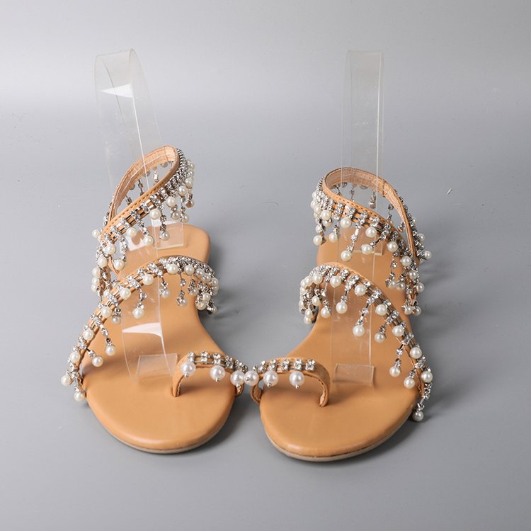 Women's opulent pearl strap sandals with hanging decorative trim, delicate toe strap, and padded comfort footbed Mune Fashion