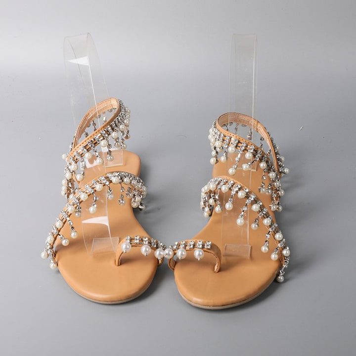 Women's opulent pearl strap sandals with hanging decorative trim, delicate toe strap, and padded comfort footbed Mune Fashion