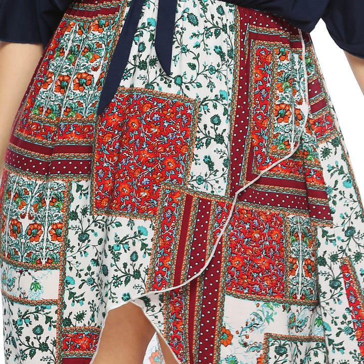 Women’s summer dress with asymmetric hem and floral pattern Mune Fashion