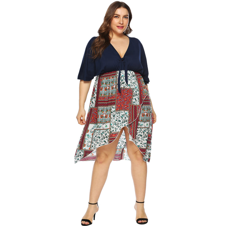 Women’s summer dress with asymmetric hem and floral pattern Mune Fashion