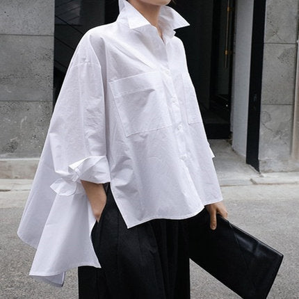 Women's oversized boxy shirt blouse made of cotton poplin with large chest pockets and side bow detail Mune Fashion