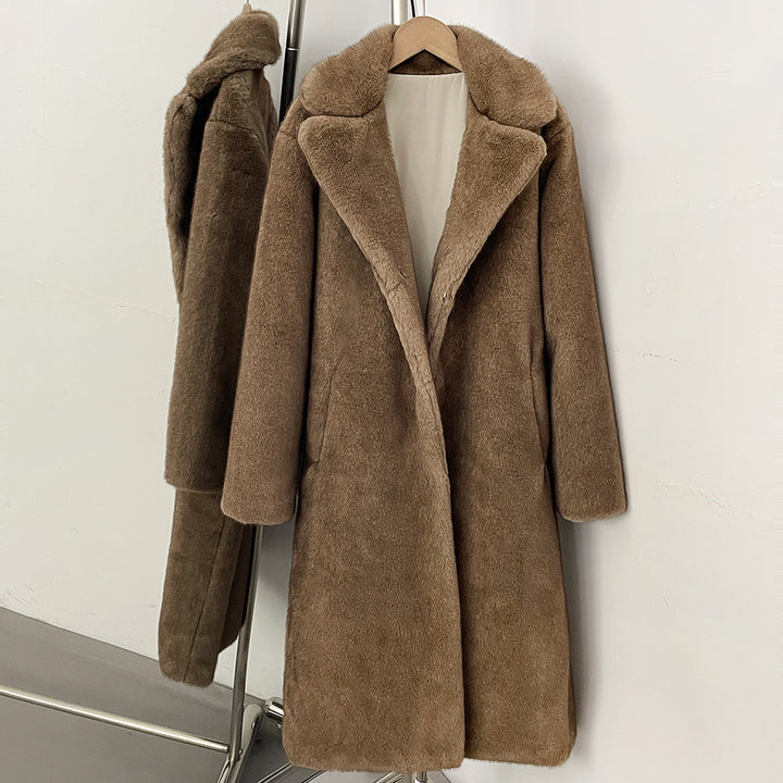 Elegant faux fur coat with lapel collar