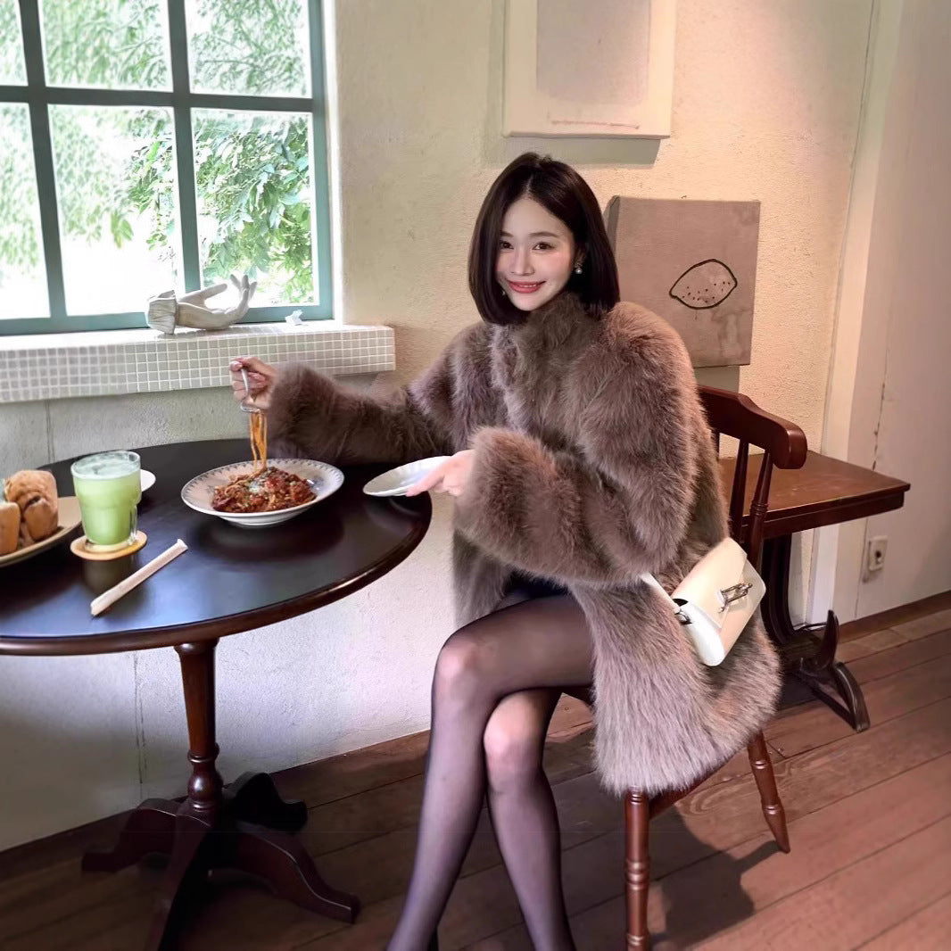 Women’s fur coat, black, mid-length, winter