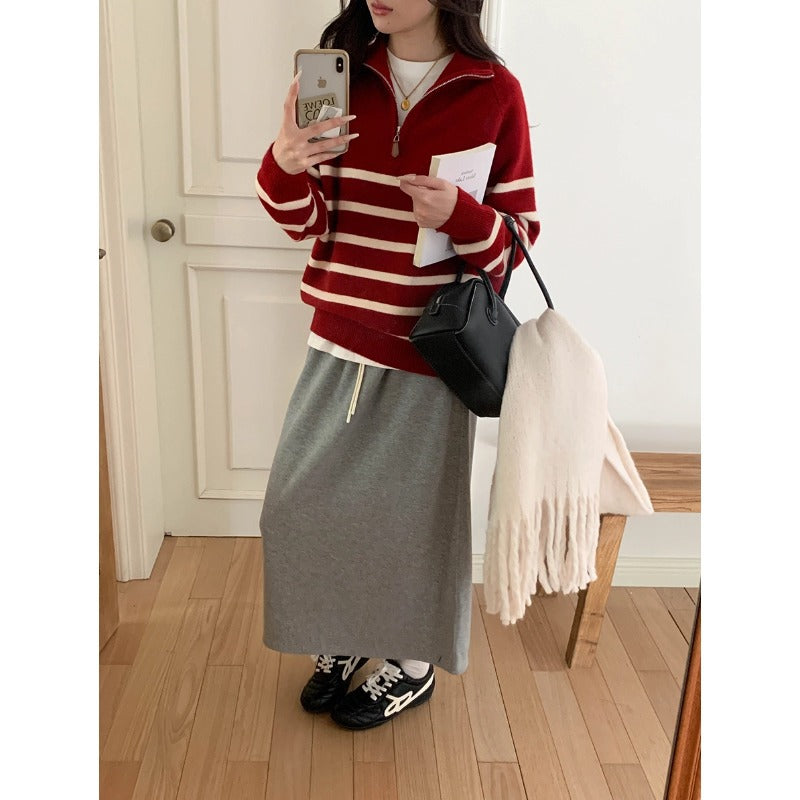 Women's sweater with zipper and stripe pattern