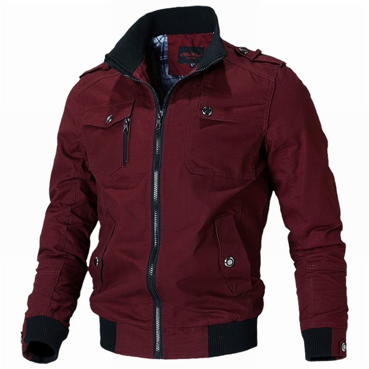 Men's fashionable field bomber jacket made of robust cotton canvas with epaulettes, zipper, and ribbed hem.