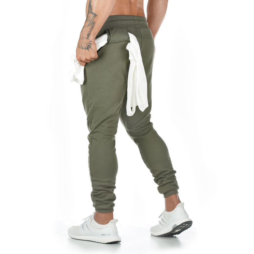 Men's narrow-cut joggers with ribbed waistband, zip pocket, and knee darts Mune Fashion