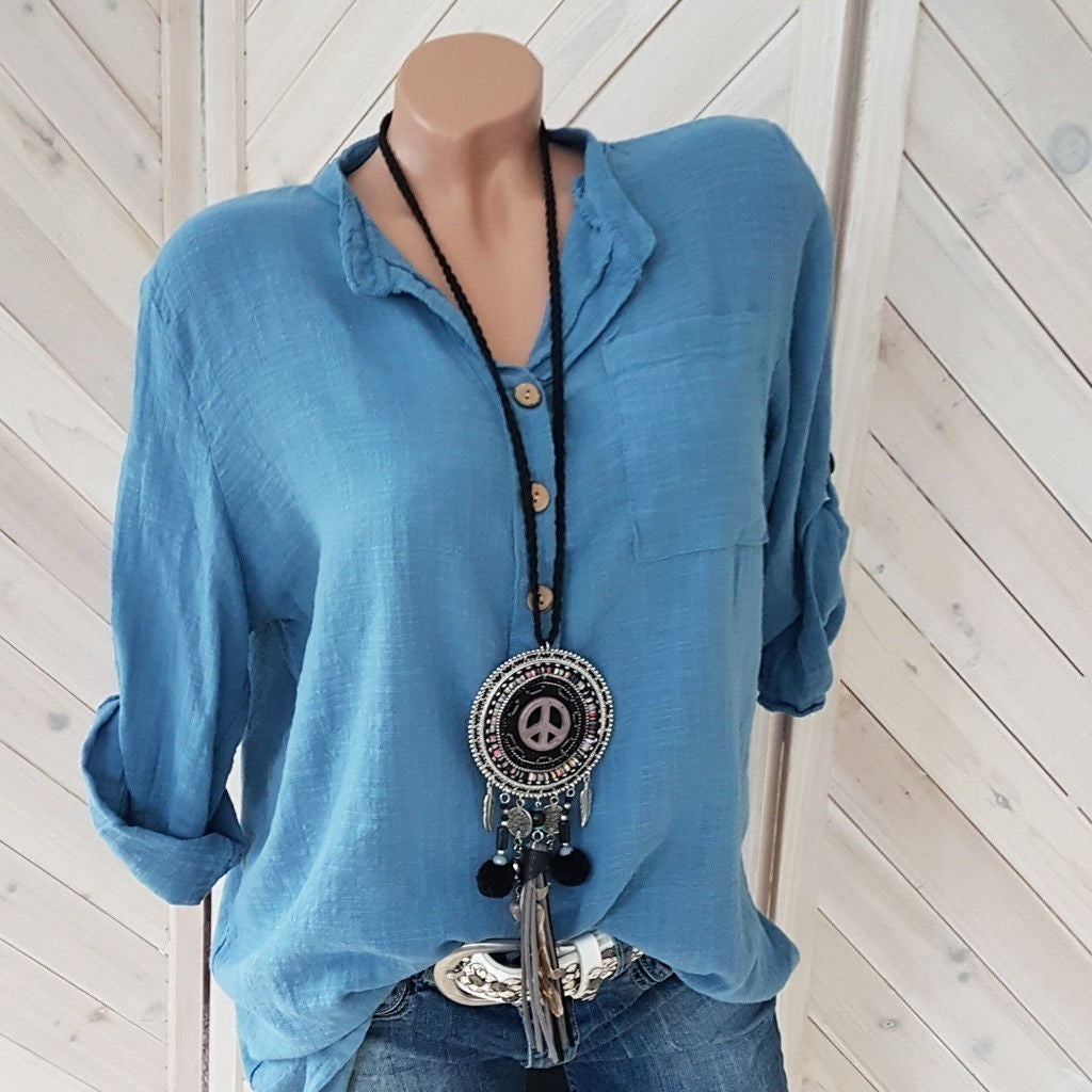 Women's lightweight crinkle tunic with half button placket, chest pocket, and roll-up sleeves Mune Fashion