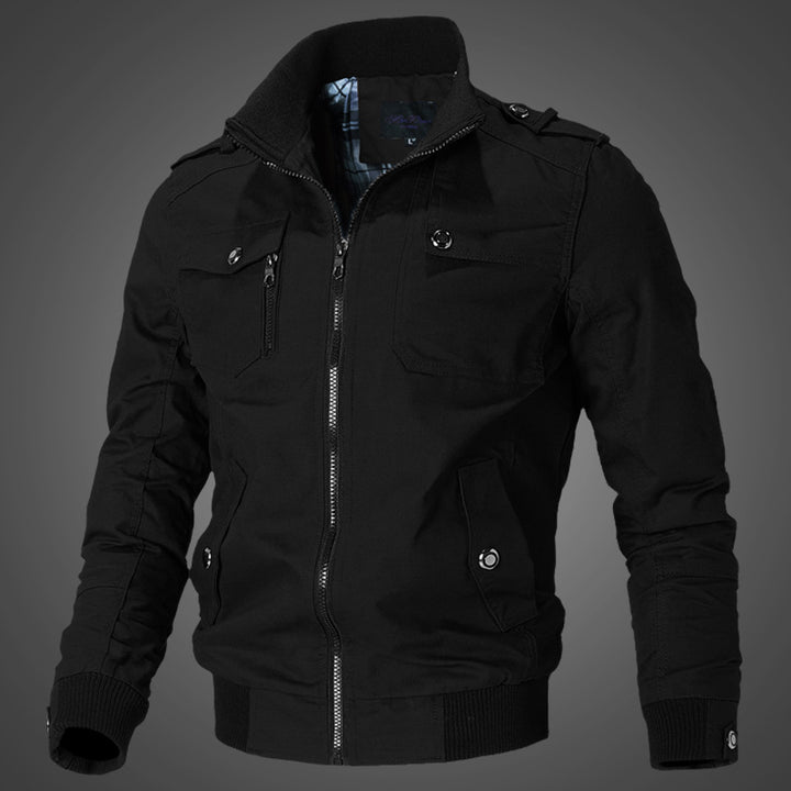 Men's urban canvas bomber jacket with ribbed cuffs, stand-up collar, and multiple chest pockets.