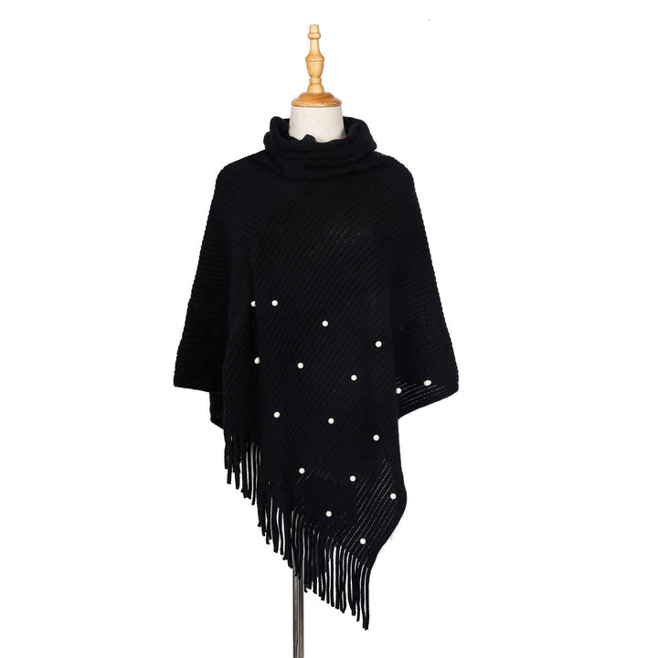Ladies fine knit poncho with roll neck, bead appliqué and fringe hem Mune Fashion