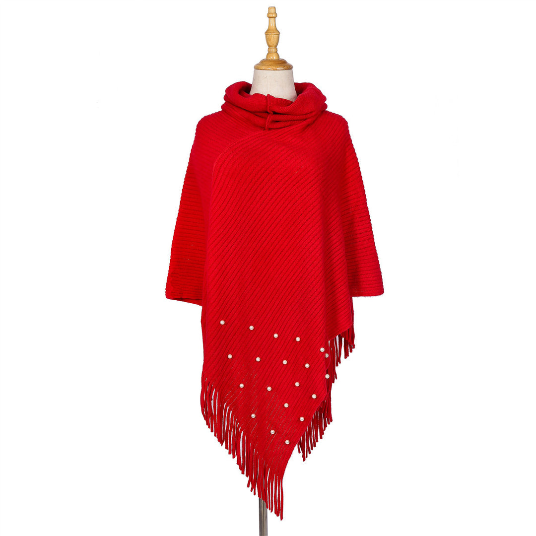 Ladies fine knit poncho with roll neck, bead appliqué and fringe hem Mune Fashion