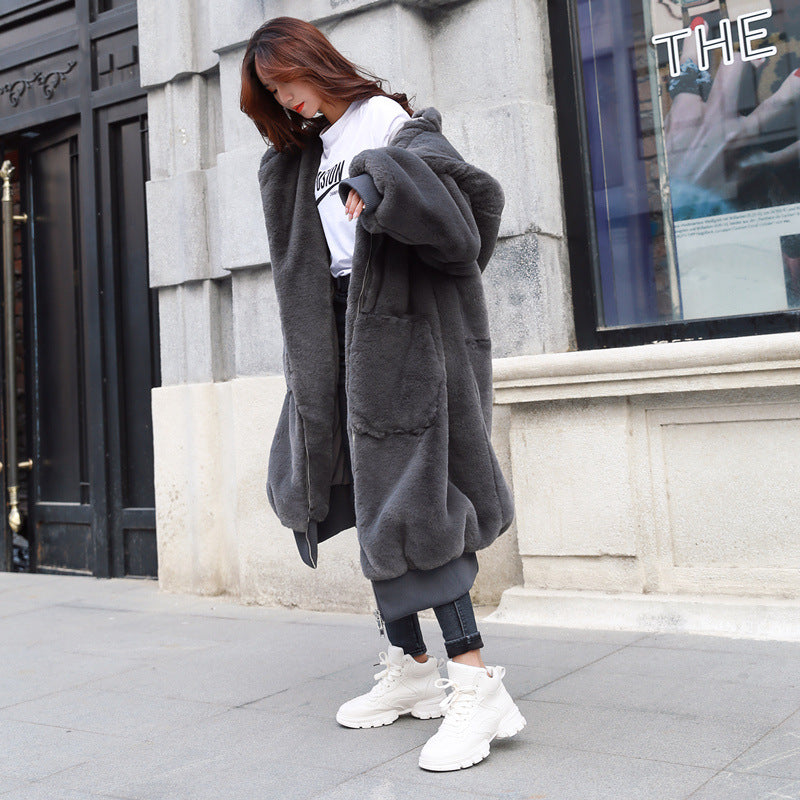 Long ladies' hooded jacket in rabbit fur look
