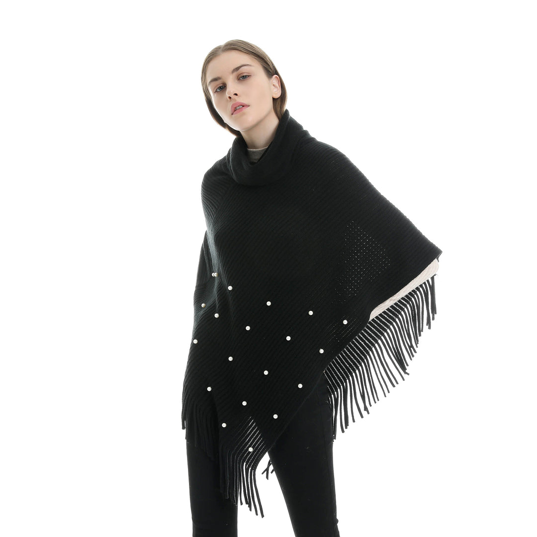 Ladies fine knit poncho with roll neck, bead appliqué and fringe hem Mune Fashion