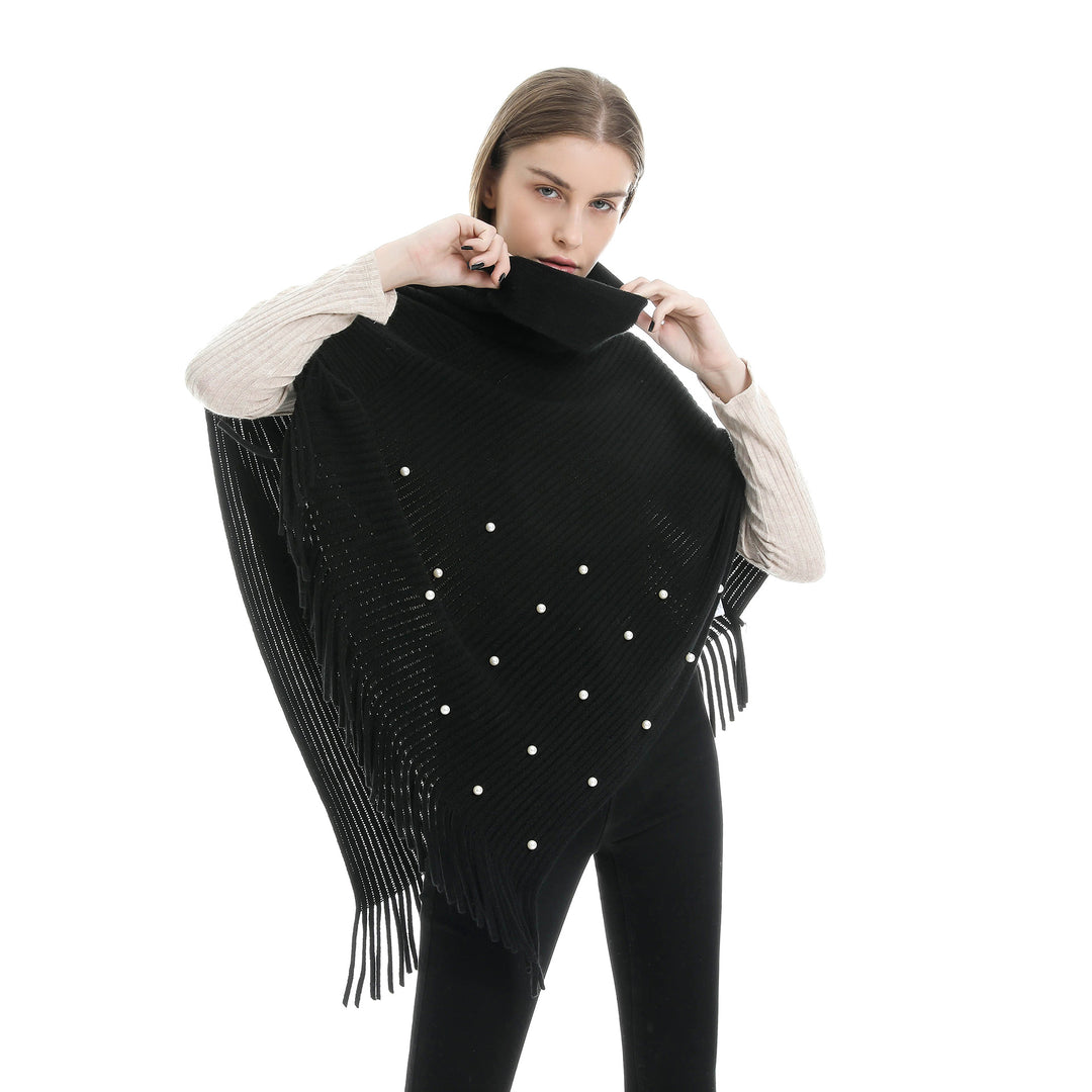 Ladies fine knit poncho with roll neck, bead appliqué and fringe hem Mune Fashion