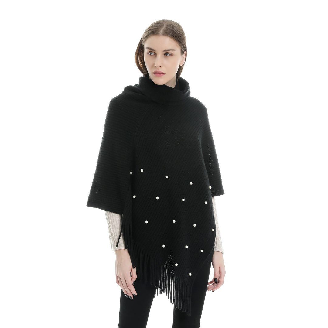 Ladies fine knit poncho with roll neck, bead appliqué and fringe hem Mune Fashion