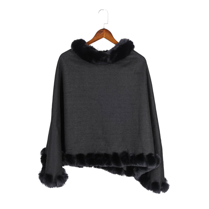 Women's finely knitted ruana poncho with faux fur trim and asymmetric hem Mune Fashion