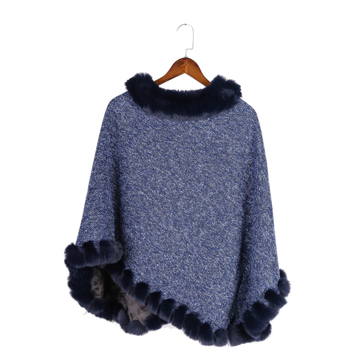 Women's finely knitted ruana poncho with faux fur trim and asymmetric hem Mune Fashion