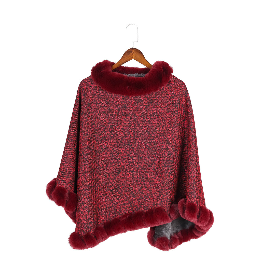 Women's finely knitted ruana poncho with faux fur trim and asymmetric hem Mune Fashion
