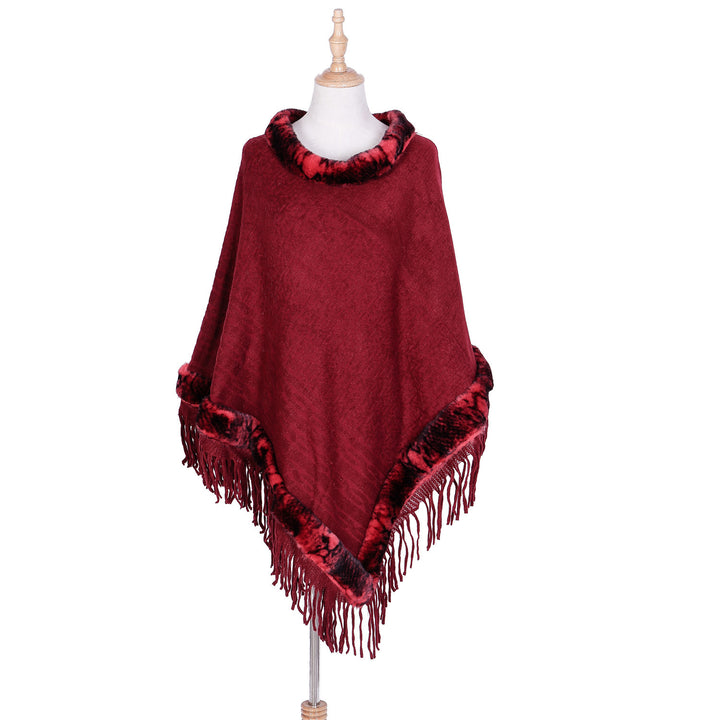 Ladies elegant wool blend poncho with faux fur trim and fringed hem Mune Fashion