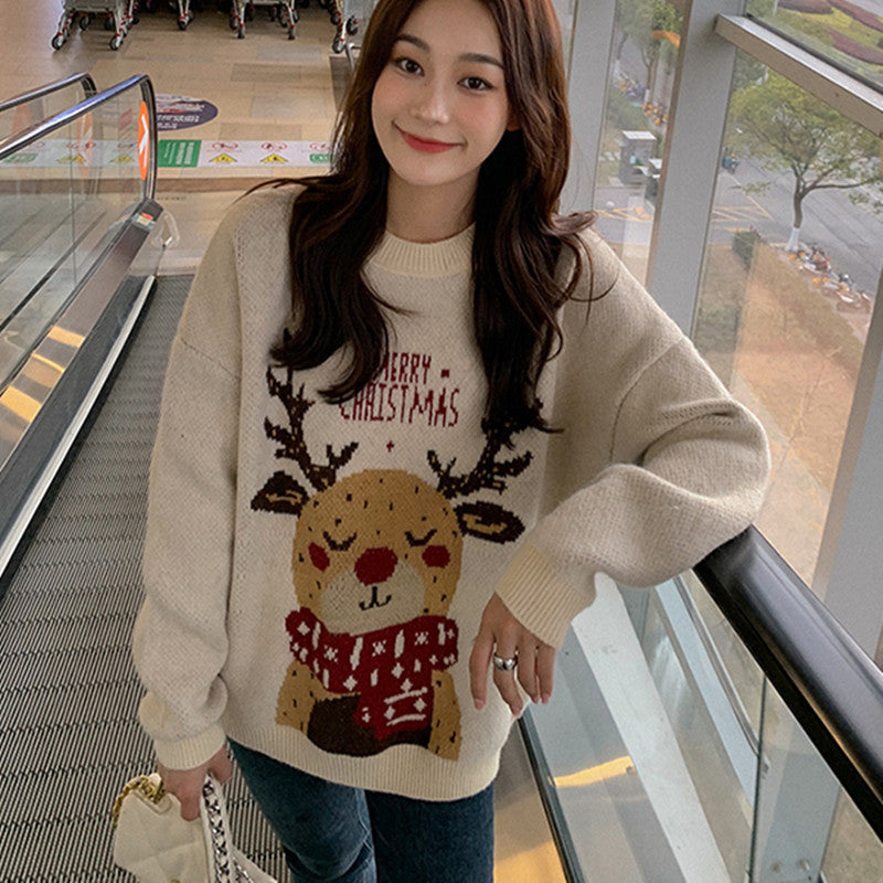 Loose women's Christmas sweater with reindeer motif