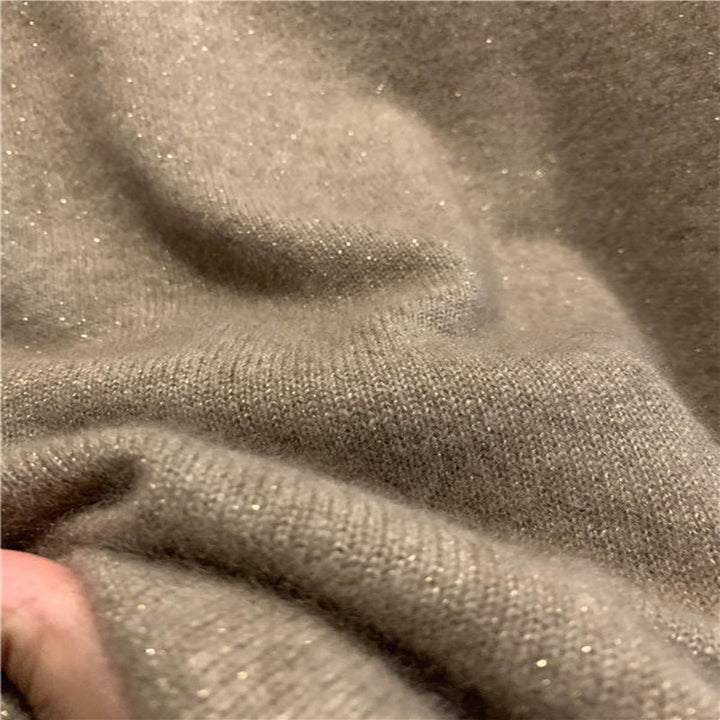 Women's wool pullover with stand-up collar and shine effect