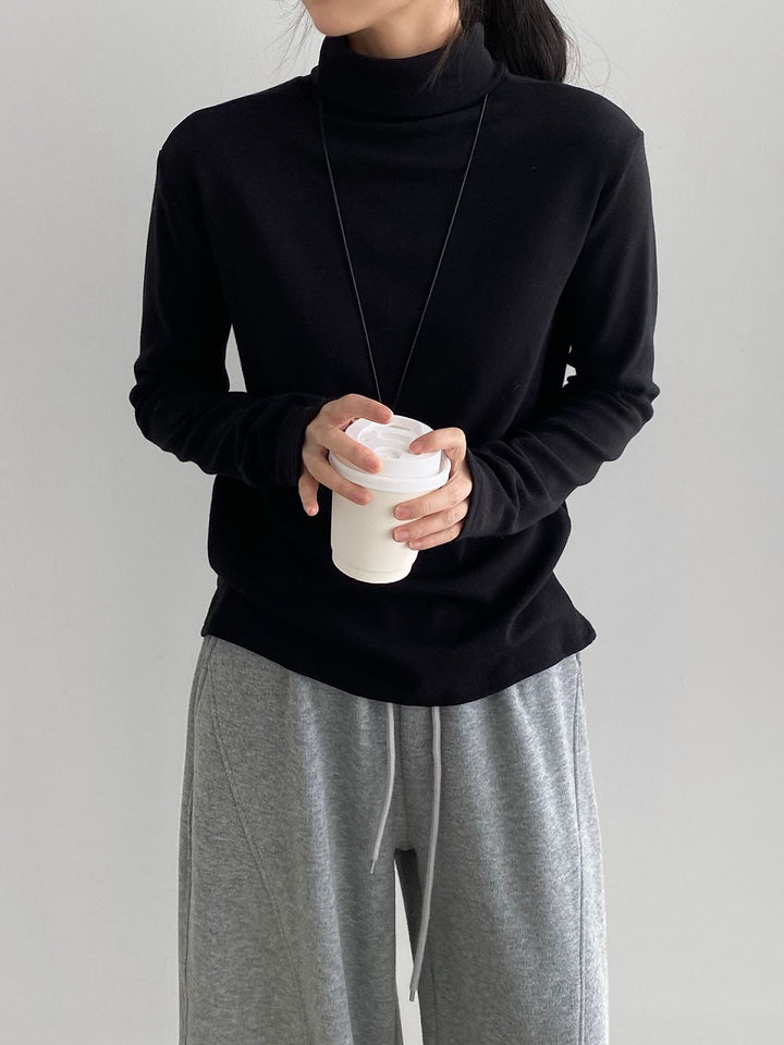 Women's knitted sweater with stand-up collar, soft