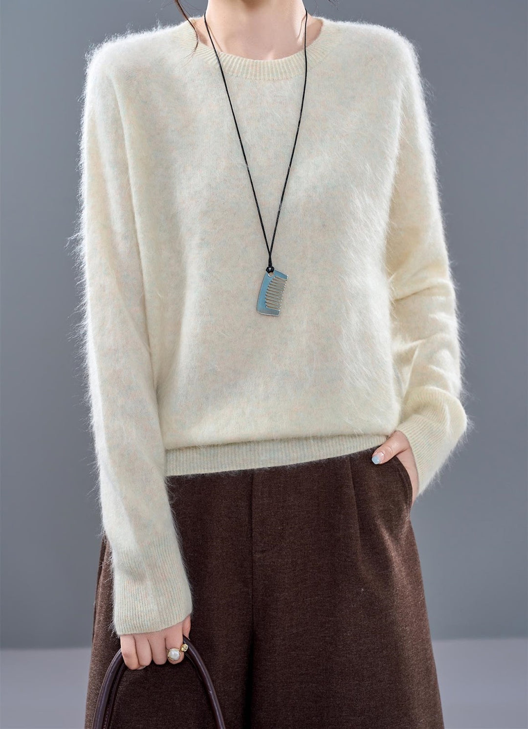 Women's knit sweater made of wool blend with V-neck