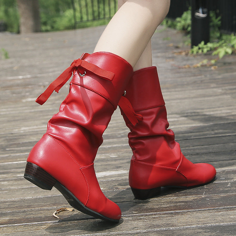 Women's knee-high boots with gathered shaft, satin bow, and low block heel Mune Fashion