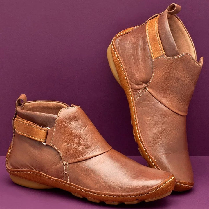 Women's ankle-high soft leather imitation ankle boots with adjustable Velcro strap, padded shaft, and flexible profile sole Mune Fashion
