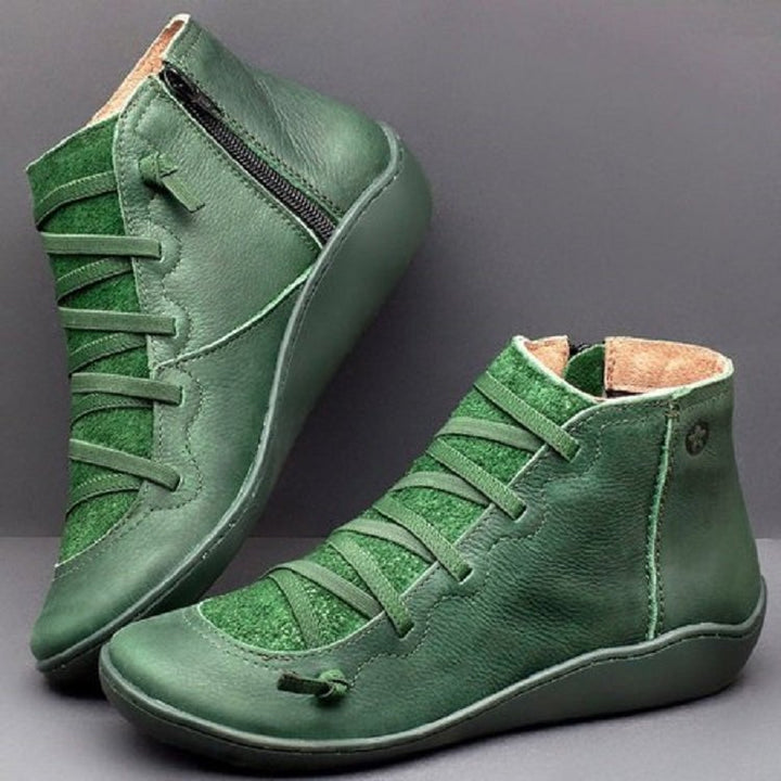 Women's ankle-high leather ankle boots with side zipper, elastic lacing, and padded insole Mune Fashion