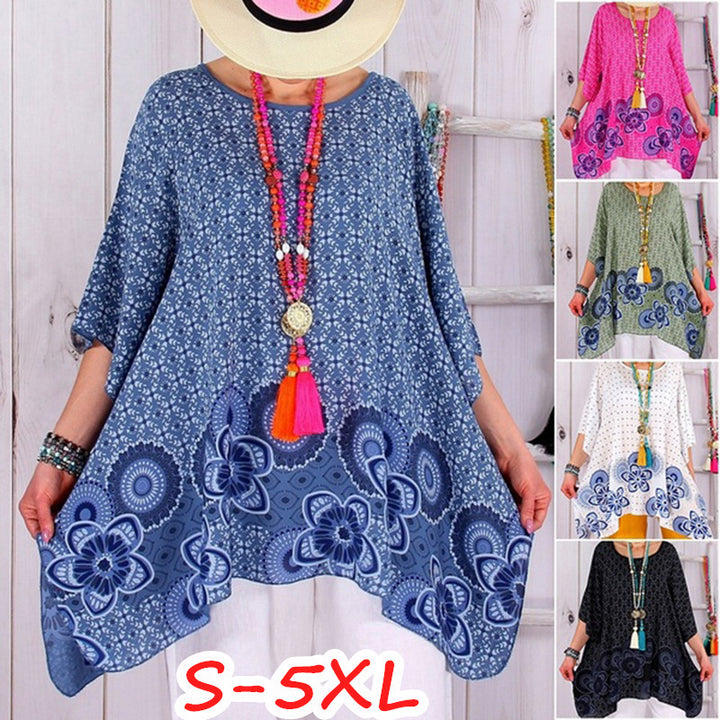 Women's flowing viscose blend tunic in Boho style with floral trim, asymmetrical hem, and 3/4 sleeves Mune Fashion