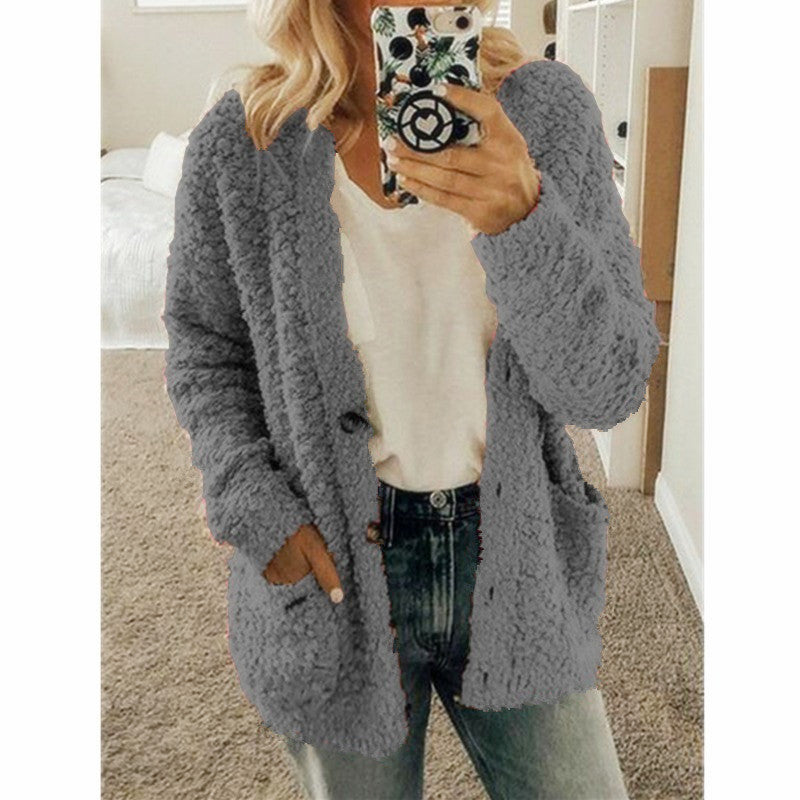 Women’s cropped teddy fleece cardigan with subtle button placket and patch pockets Mune Fashion