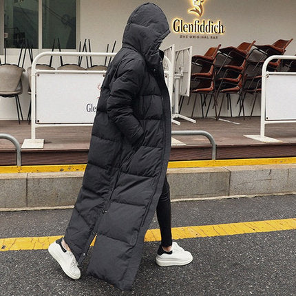 Women's maximal long quilted coat with hood, windproof thermal filling and side zippers Mune Fashion