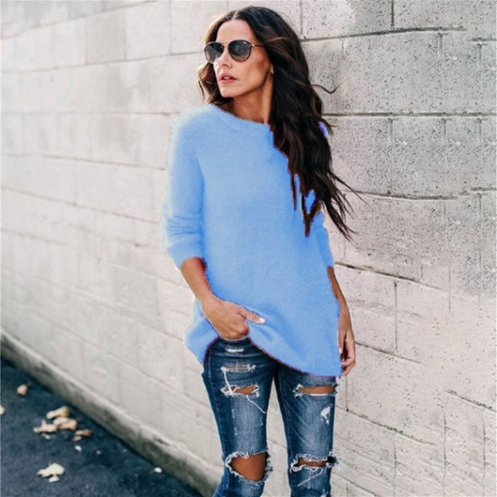 Women's cozy oversized knit sweater with round neckline, high-low hem, and side slits Mune Fashion