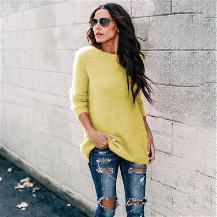 Women's cozy oversized knit sweater with round neckline, high-low hem, and side slits Mune Fashion