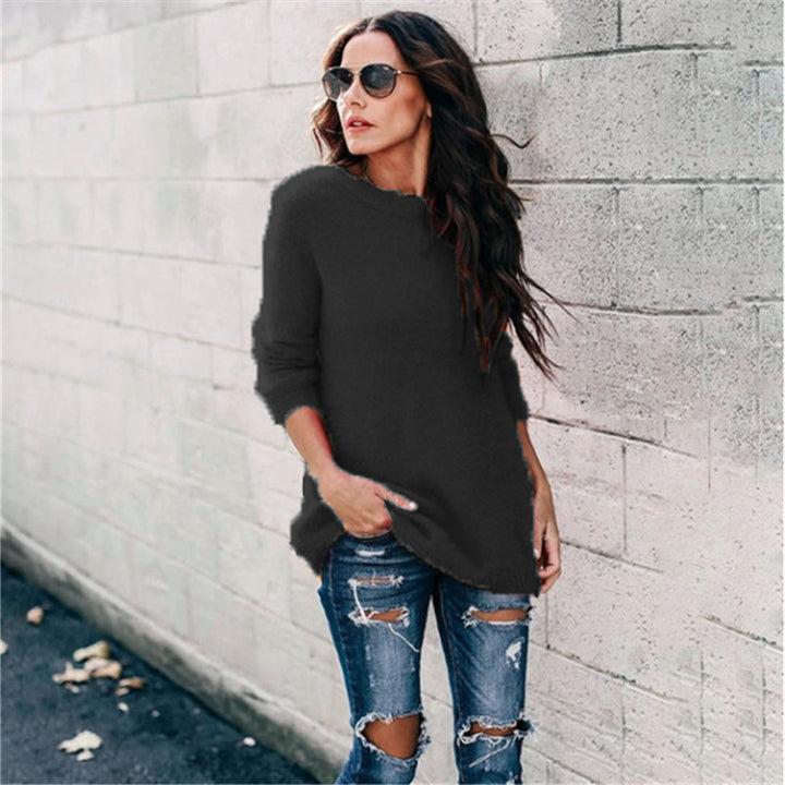 Women's cozy oversized knit sweater with round neckline, high-low hem, and side slits Mune Fashion