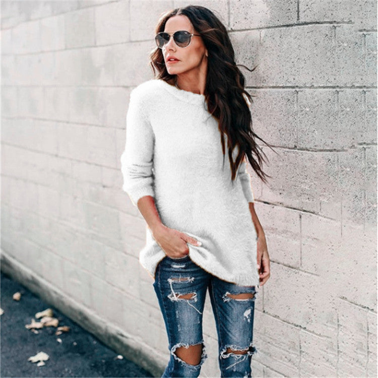Women's cozy oversized knit sweater with round neckline, high-low hem, and side slits Mune Fashion