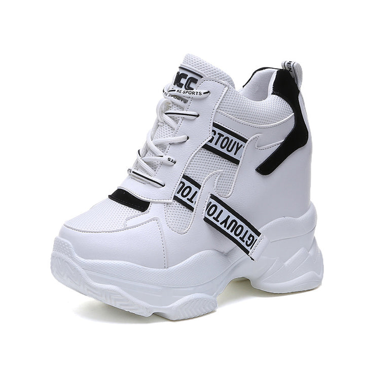 Women’s ankle-high platform leisure shoe with hidden wedge heel and distinctive decorative straps Mune Fashion