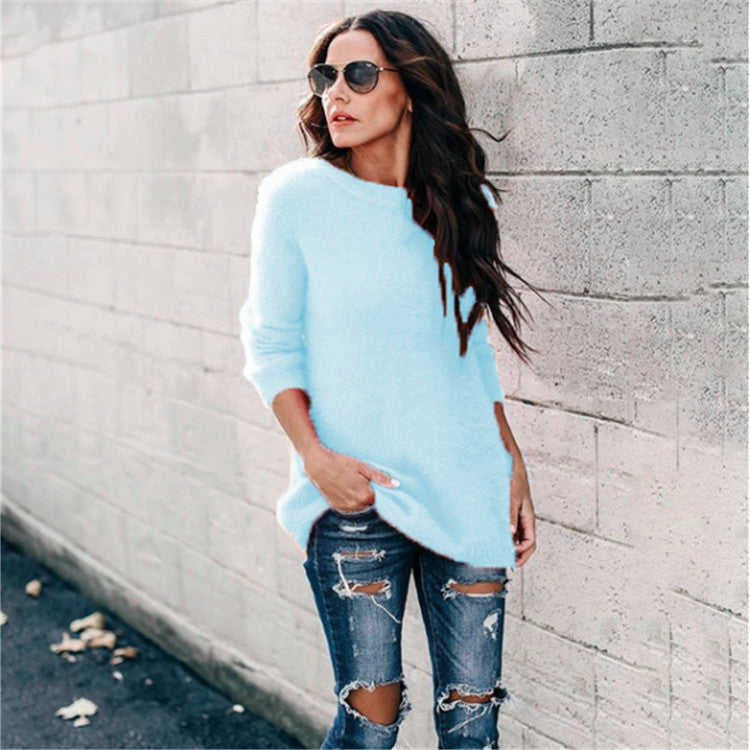 Women's cozy oversized knit sweater with round neckline, high-low hem, and side slits Mune Fashion