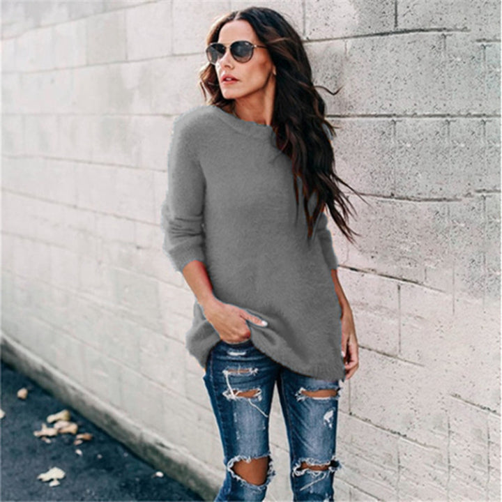 Women's cozy oversized knit sweater with round neckline, high-low hem, and side slits Mune Fashion