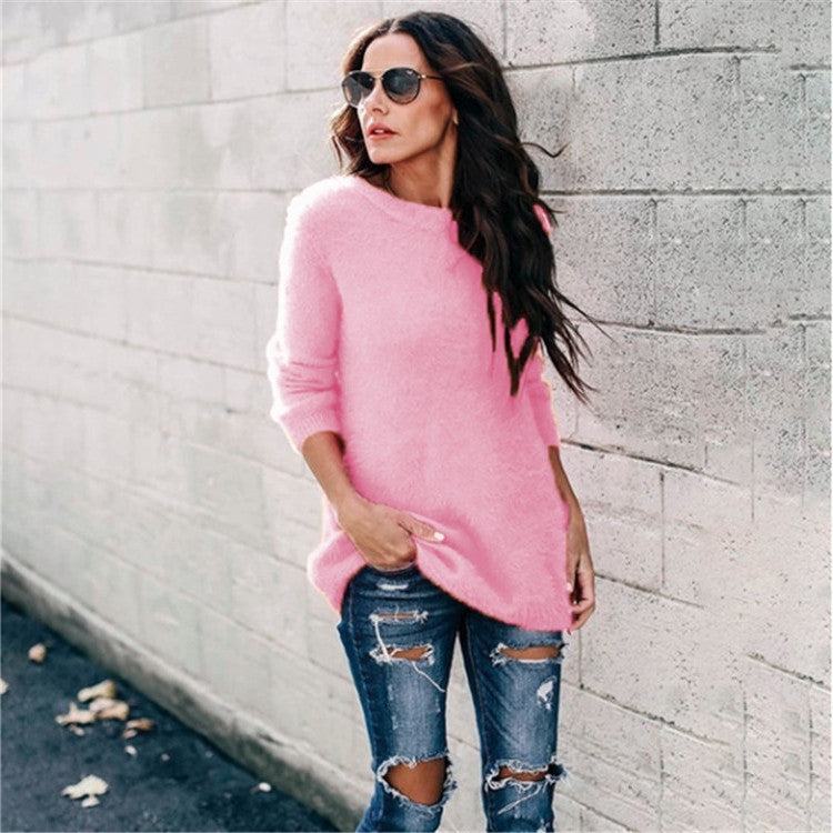 Women's cozy oversized knit sweater with round neckline, high-low hem, and side slits Mune Fashion