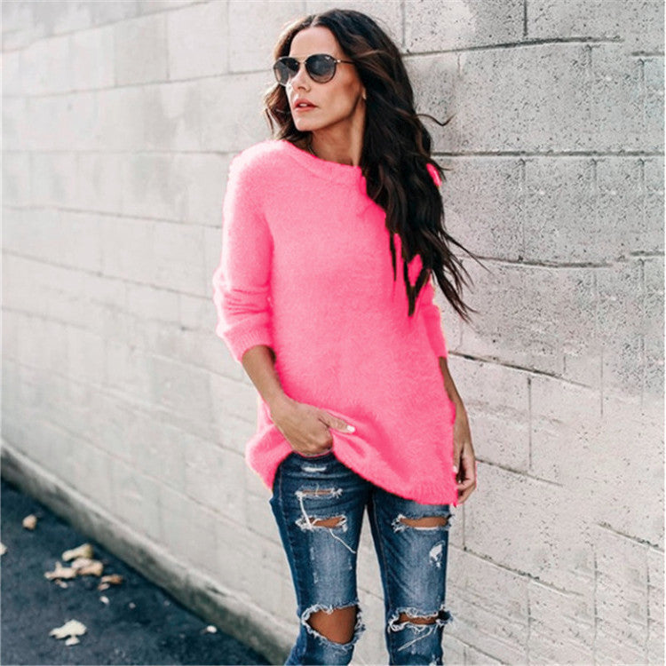 Women's cozy oversized knit sweater with round neckline, high-low hem, and side slits Mune Fashion